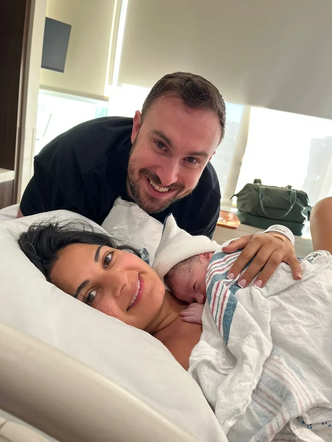 Newborn baby with loving parents
