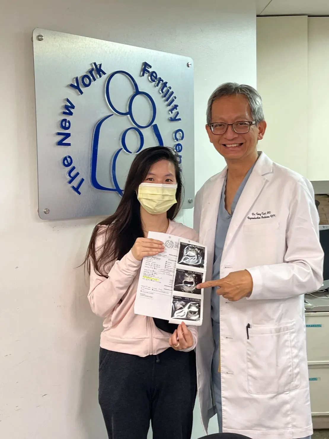 Woman and doctor with ultrasound images