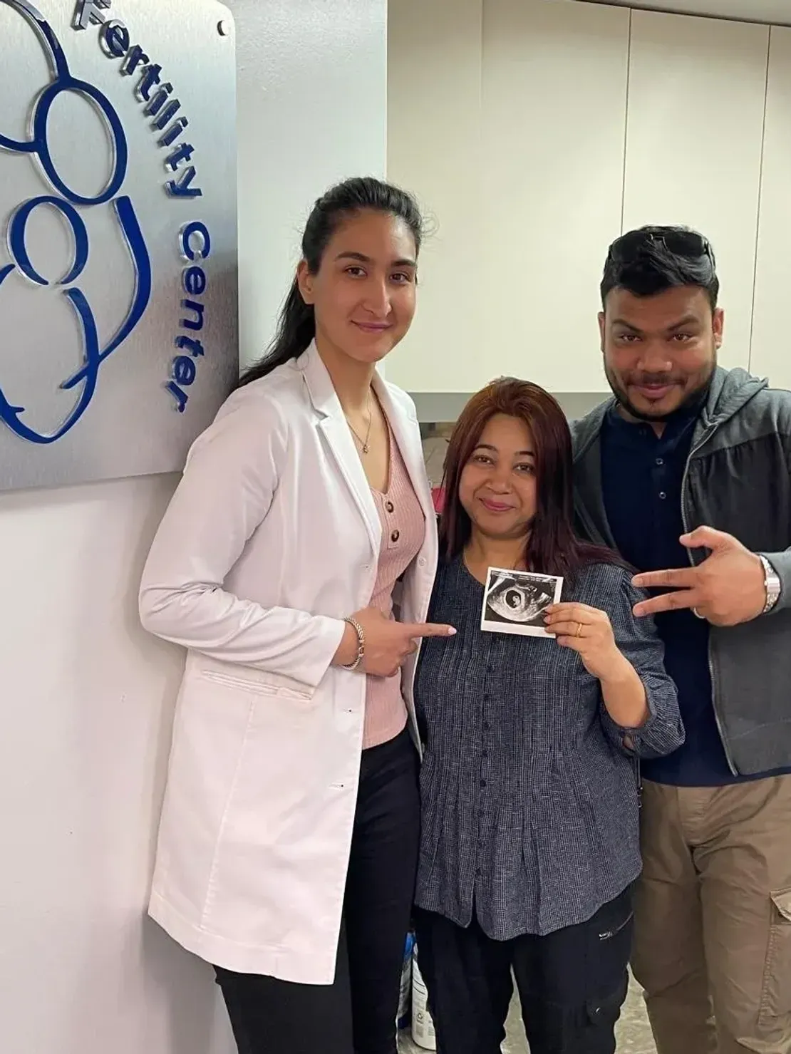 Happy couple at fertility clinic